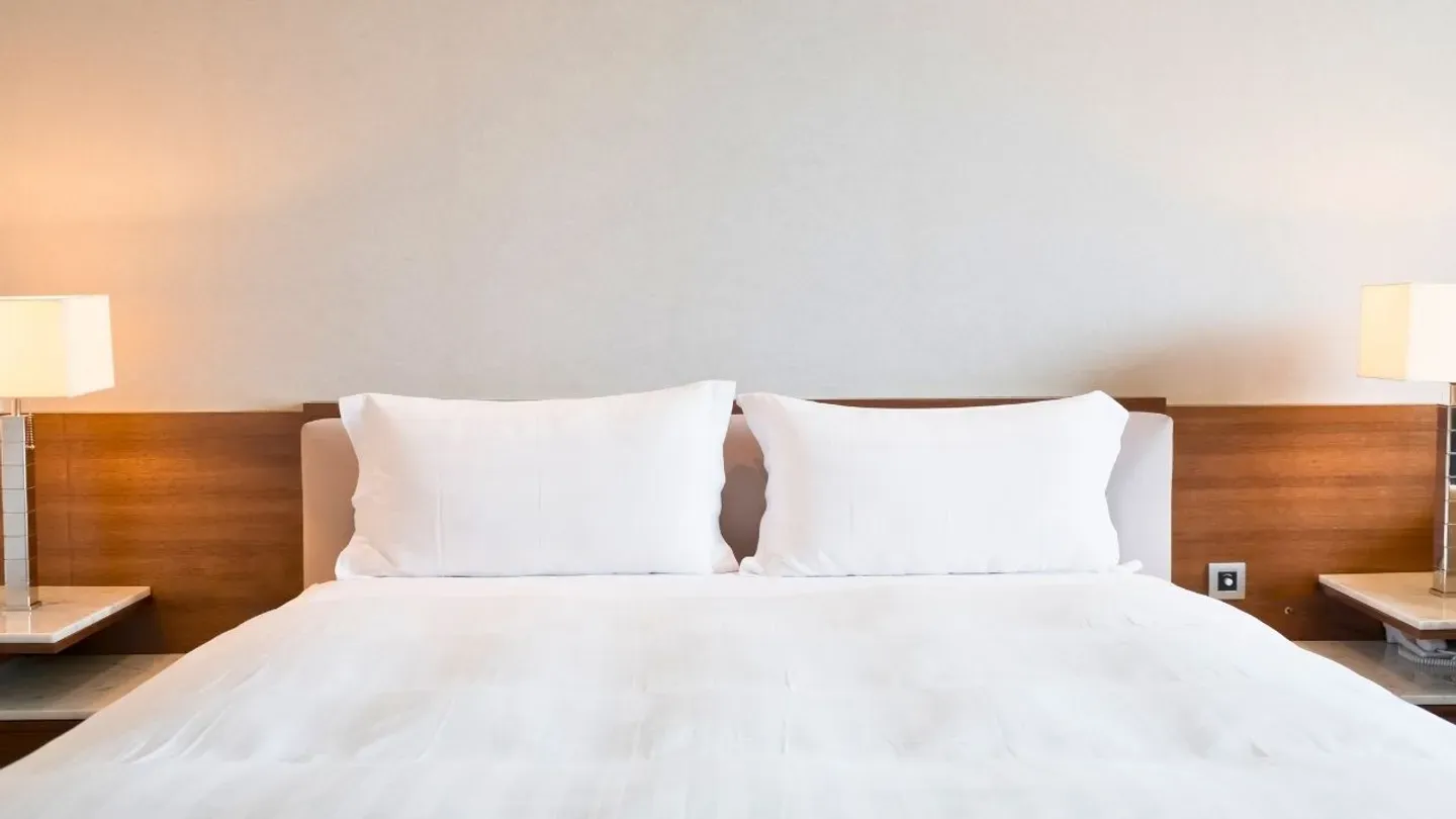 A cosy and well-maintained hotel room.