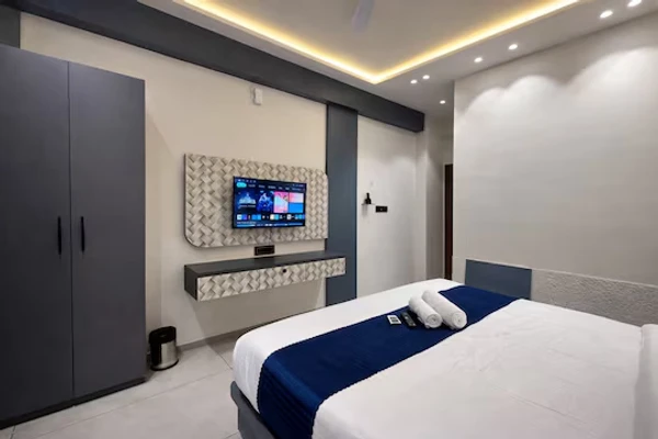 budget hotel in gidc vatwa, ahmedabad - axon business hotel sanand