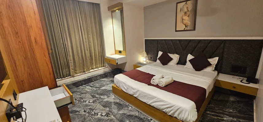 hotel with gym in sp ring road, ahmedabad - hotel aatithy