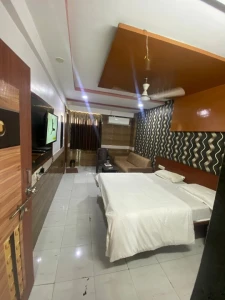 family hotel with pool in sp ring road, ahmedabad - hotel anand palace inn