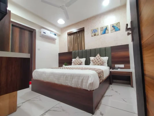 hotel with free parking in chandkheda, ahmedabad - hotel asiana motera