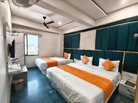 hotel with free parking in motera, ahmedabad - hotel karnavati motera ahmedabad