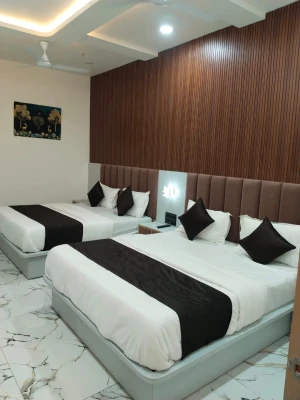 hotel with party hall in chandkheda, ahmedabad - hotel lotus inn