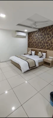 family hotel with pool in gandhinagar, ahmedabad - hotel nest view in