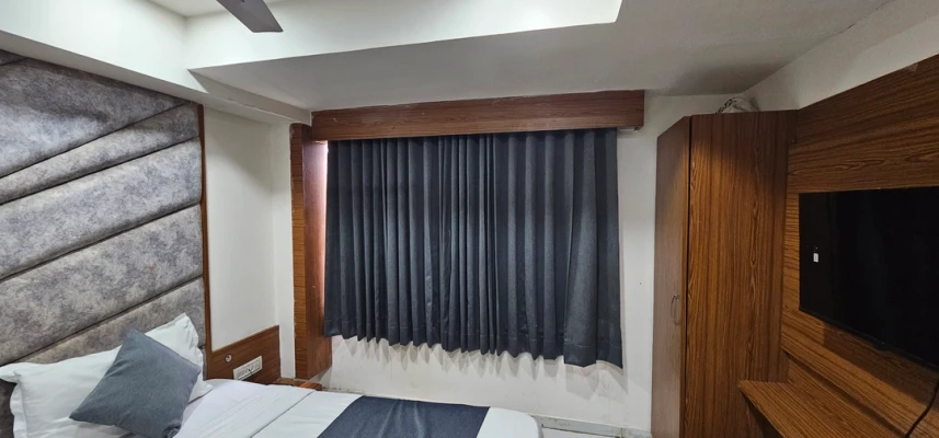 family hotel with pool in chandkheda, ahmedabad - hotel new kunj villa