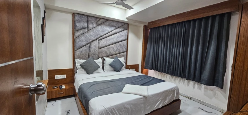 hotel room booking in chandkheda, ahmedabad - hotel new kunj villa
