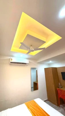 family hotel with pool in naranpura, ahmedabad - hotel orange tree