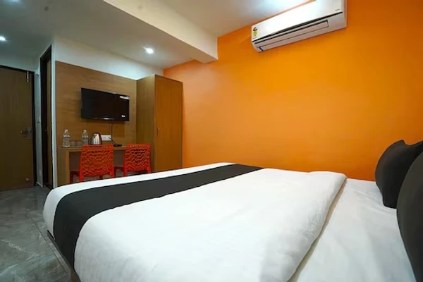 hotel with free parking in naranpura, ahmedabad - hotel orange tree