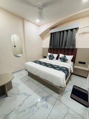 hotel with meeting room in ellisbridge, ahmedabad - hotel plan sky