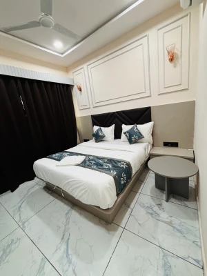 hotel with swimming pool in ellisbridge, ahmedabad - hotel plan sky
