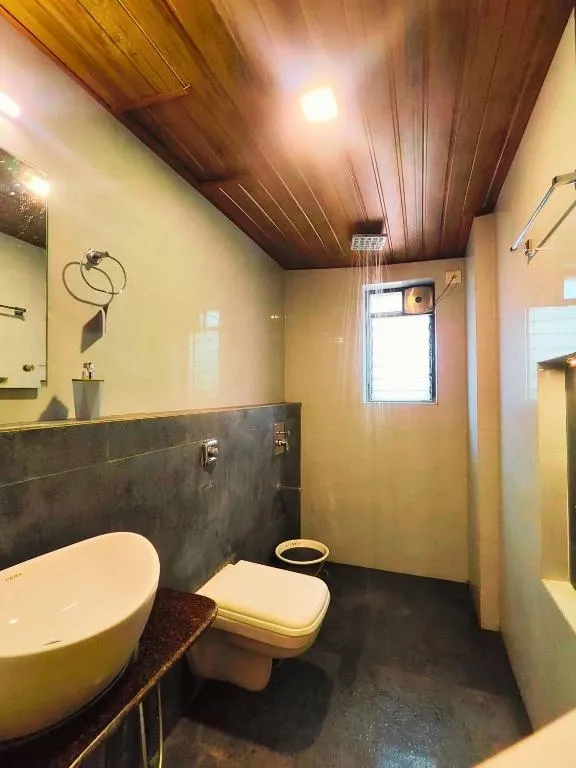 hotel with free parking in nagaon, alibag - fortune resort