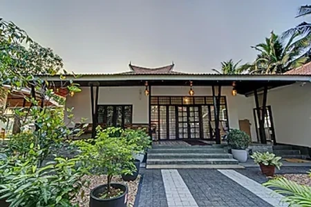 hotel with party hall in kanichukulangara, alleppey - elivaas breeze and grains 3 bhk with verandah & outdoor patio