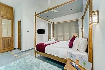 hotel near alleppey railway station - elivaas breeze and grains 3 bhk with verandah & outdoor patio