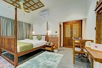 hotel with gym in kanichukulangara, alleppey - elivaas breeze and grains 3 bhk with verandah & outdoor patio