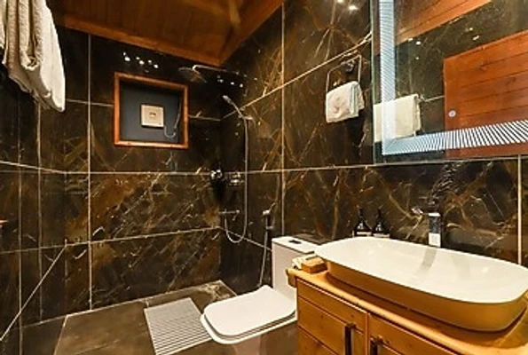 hotel with free parking in ladpur, alwar - elivaas riveria hills 3 bhk wooden cottage with lush garden & pvt pool