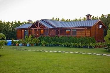 hotel with gym in ladpur, alwar - elivaas riveria hills 3 bhk wooden cottage with lush garden & pvt pool