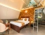 budget hotel in yelahanka, bangalore - alaya stays inara retreat cottage with a mezzanine loft, shared pool