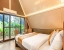 hotel room booking in yelahanka, bangalore - alaya stays inara retreat cottage with a mezzanine loft, shared pool