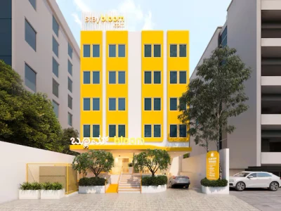 hotel with gym in rajaji nagar, bangalore - bloom hotel iskcon rajajinagar