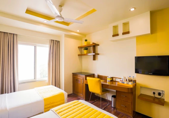 early check in hotels in bloom suites electronic city bangalore