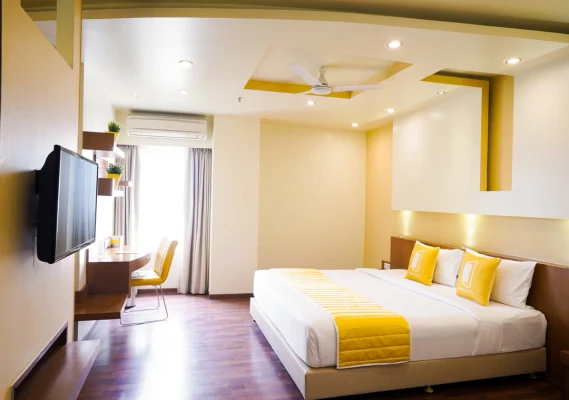hotel in electronic city, bangalore for family - bloom suites electronic city