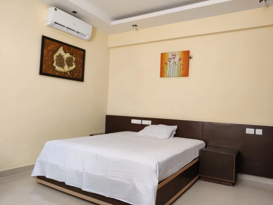 hotel with gym in hrbr layout, bangalore - fernandes complex