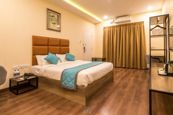 hotel with swimming pool in ashwath nagar, bangalore - hotel caramel