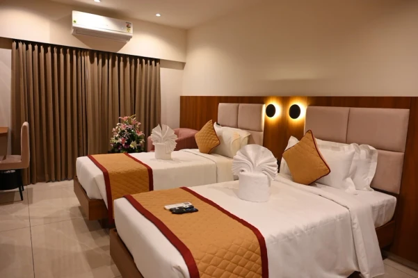 hotel with free parking in thanisandra, bangalore - hotel good one suites