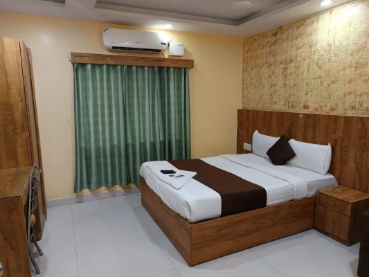 hotel with swimming pool in koramangala, bangalore - hotel gs suites koramangala