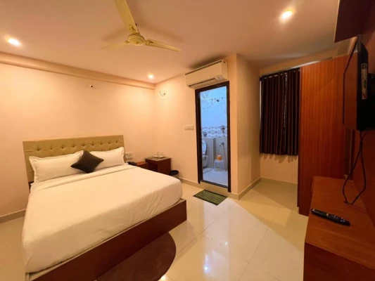 hotel with party hall in btm layout, bangalore - hotel intourist by agira hotels