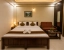 hotel with bar in thanisandra, bangalore - hotel santhi comfort