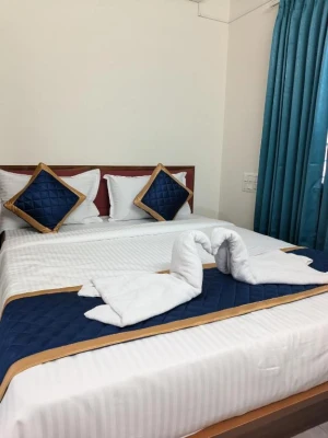 hotel with party hall in yelahanka, bangalore - hotel srinidhi inn
