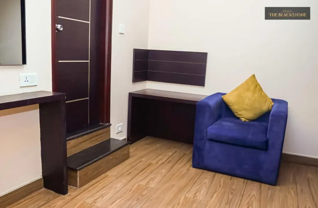 hotel with gym in koramangala, bangalore - hotel the black stone