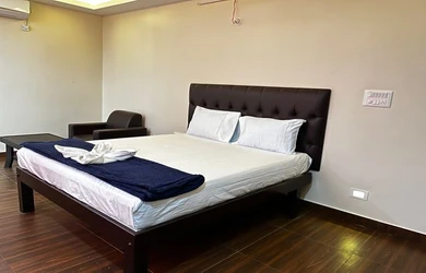 hotel room booking in devanahalli, bangalore - i care with greenery comforts