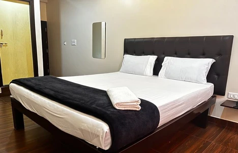 hotel room booking in devanahalli, bangalore - i care with greenery comforts