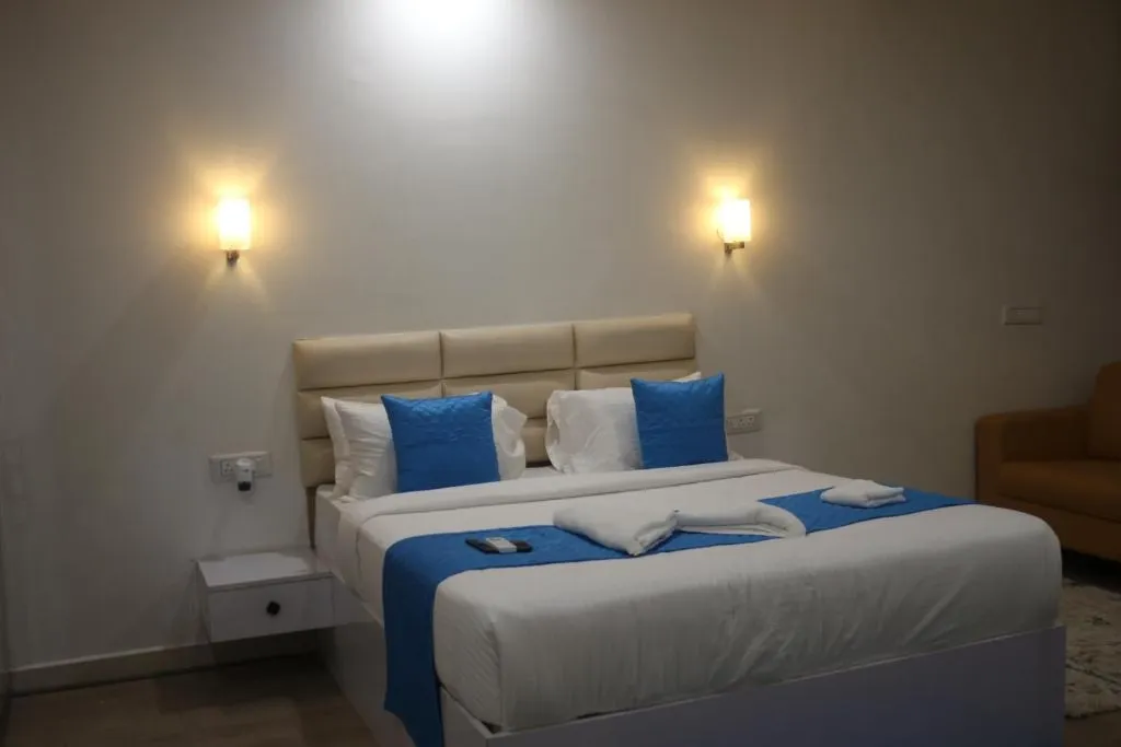 hotel room booking in nagavara, bangalore - niharika heights luxury hotel