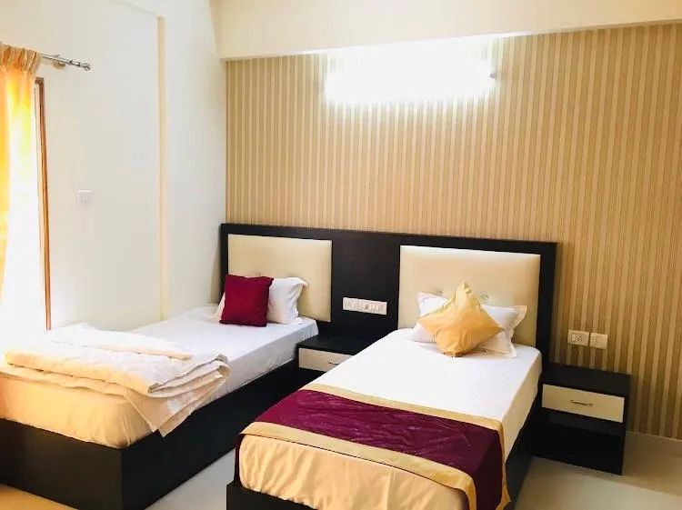 service apartment with kitchen in frazer town, bangalore - palm luxury suites & service apartments