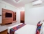 family hotel with pool in kengeri, bangalore - sk oak suites
