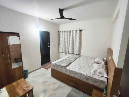 hotel room booking in hullahalli, bangalore - sm happy stay rooms