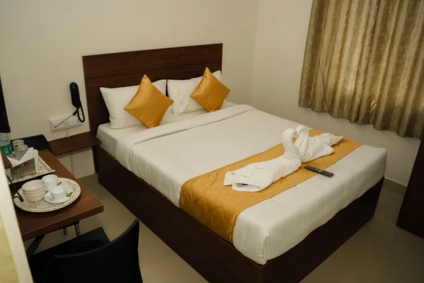 hotel with gym in thanisandra, bangalore - sri sai suites