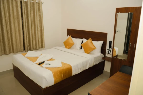 family hotel with pool in thanisandra, bangalore - sri sai suites