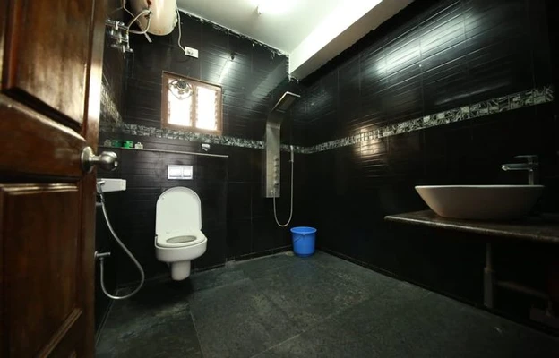 service apartment with kitchen in sanjay nagar, bangalore - tripura deluxe service apartment