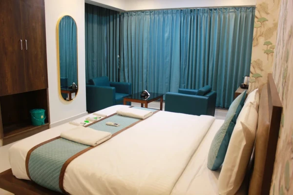 hotel with meeting room in yelahanka, bangalore - vaishnavi suites