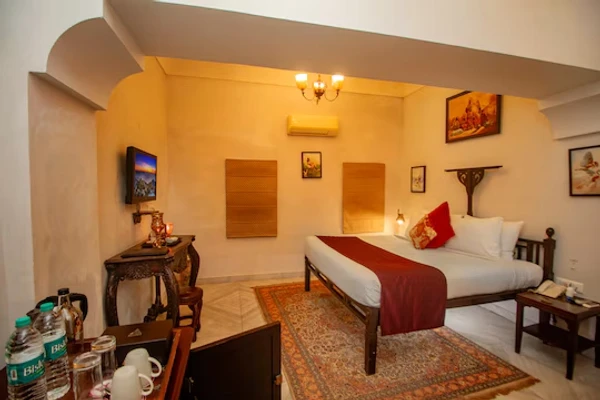 budget hotel in paharsar, bharatpur - amritara chandra mahal haveli