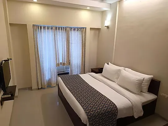 hotel with bar in bholav, bharuch - vits select bharuch