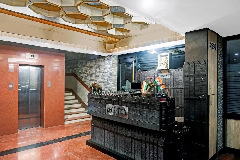 hotel with free parking in mp nagar zone 2, bhopal - hotel arq manor deluxe