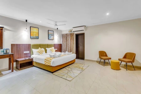 hotel with bar in perumbakkam, chennai - blossoms hotel and service apartments