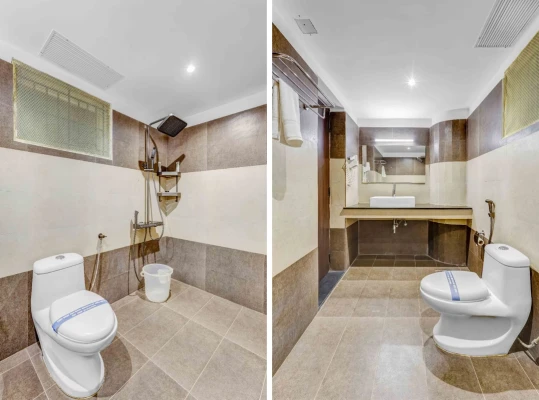 hotel with gym in perumbakkam, chennai - blossoms hotel and service apartments