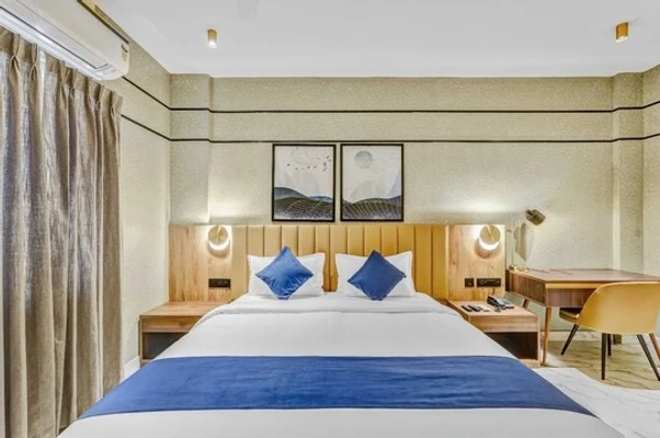 hotel with gym in perumbakkam, chennai - blossoms hotel and service apartments