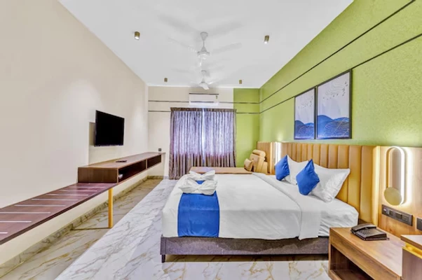 hotel with gym in perumbakkam, chennai - blossoms hotel and service apartments